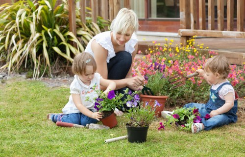 Seasonal garden care in Tottenham Green with pruning and lawn upkeep